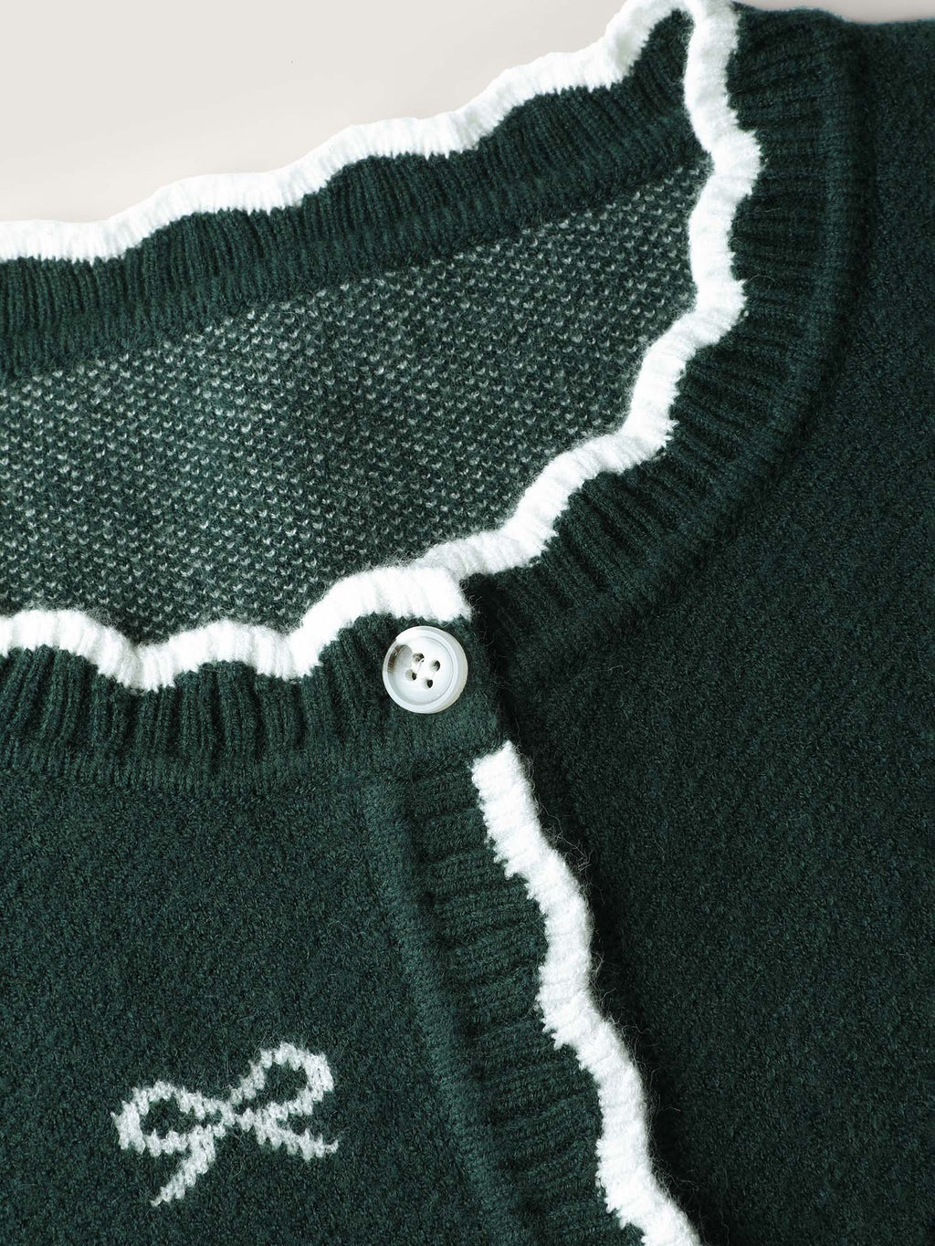 Bowknot Jacquard Wavy Edge Knit Cardigan