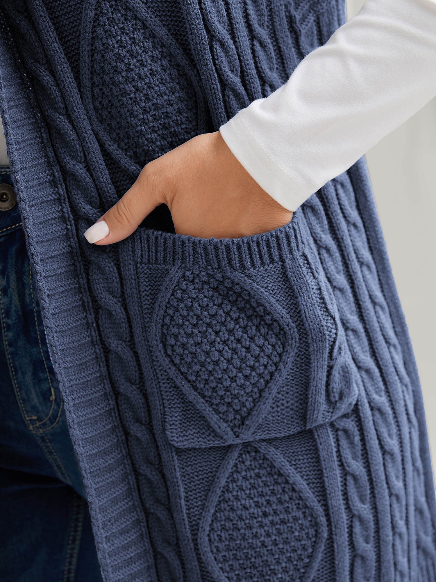 Twisted Hooded Sleeveless Knit Cardigan