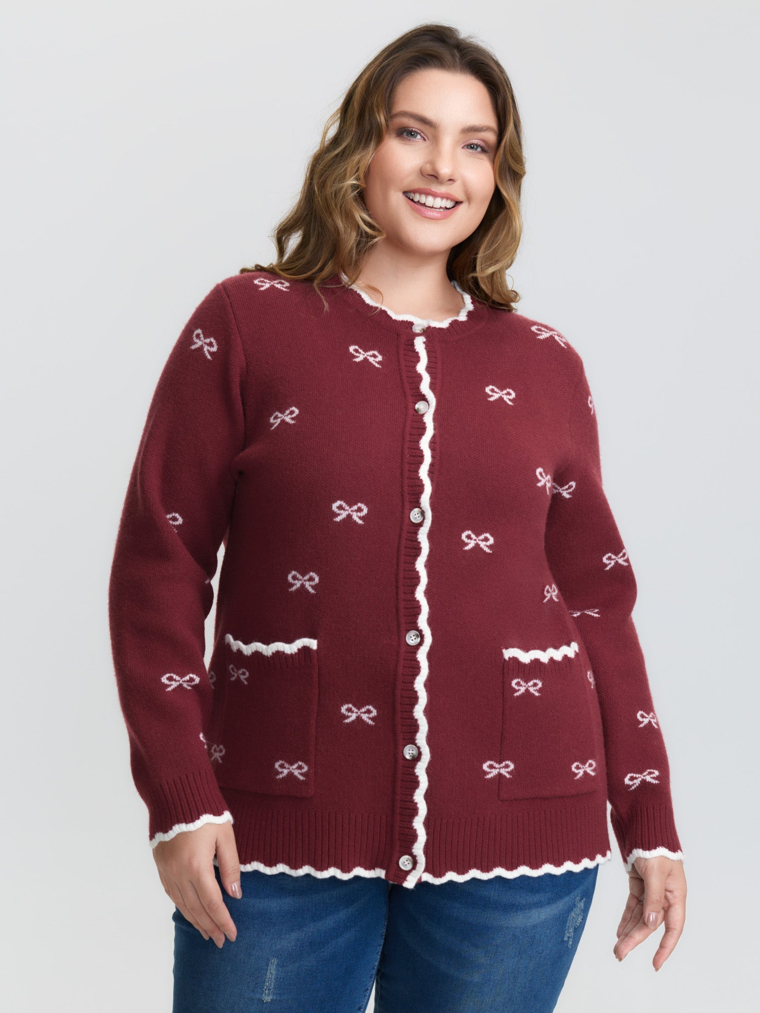 Bowknot Jacquard Wavy Edge Knit Cardigan