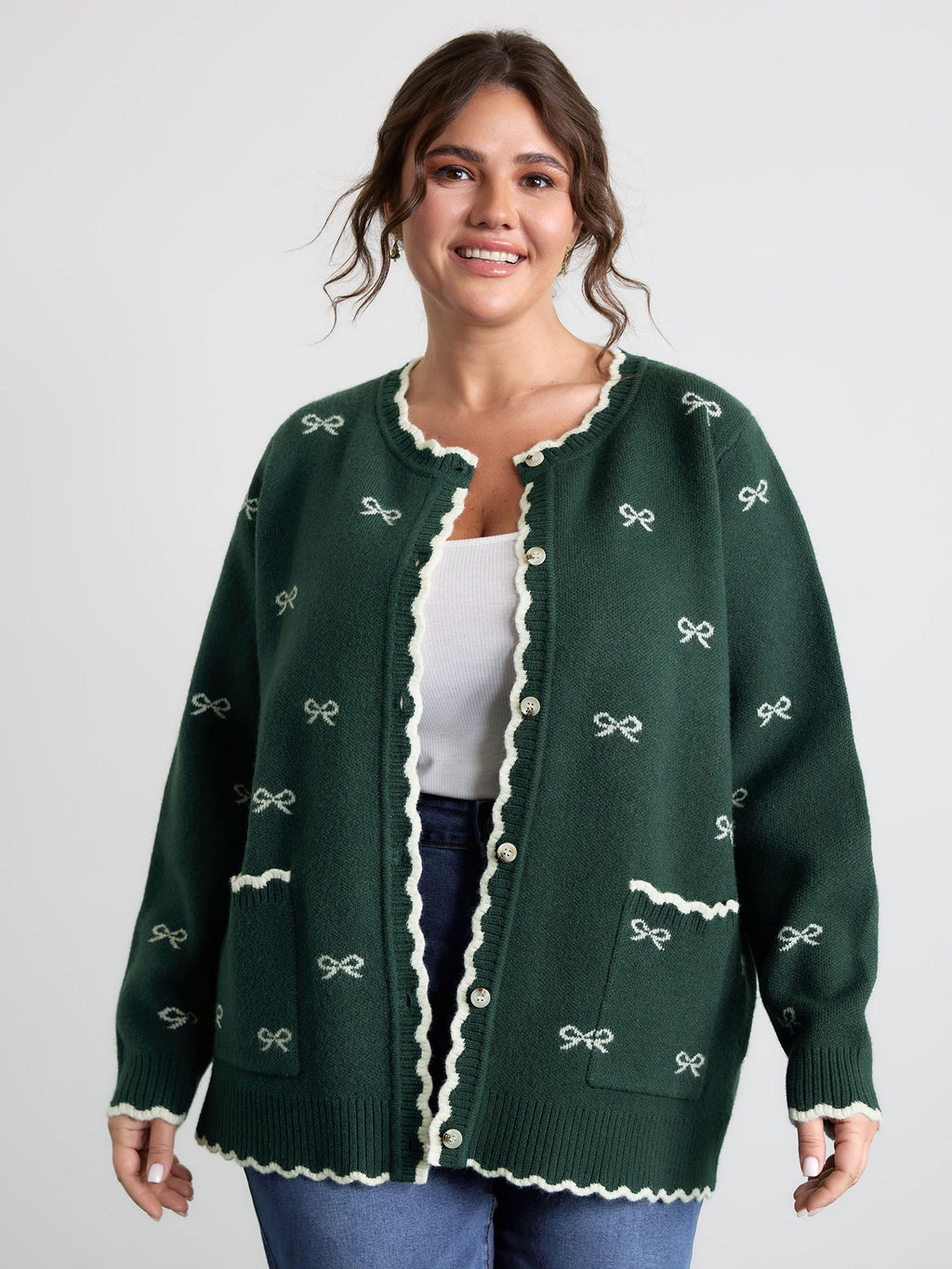 Bowknot Jacquard Wavy Edge Knit Cardigan