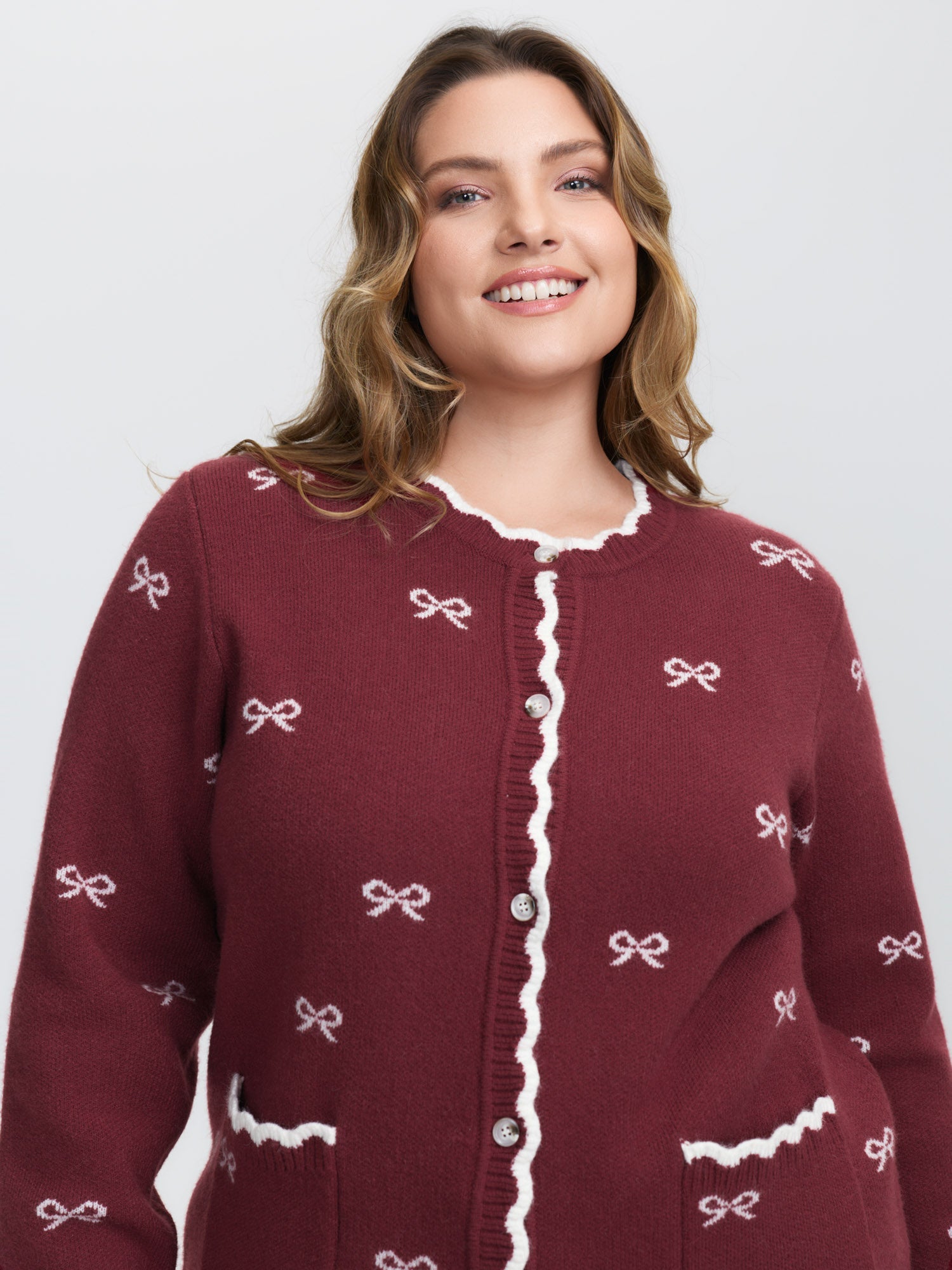Bowknot Jacquard Wavy Edge Knit Cardigan